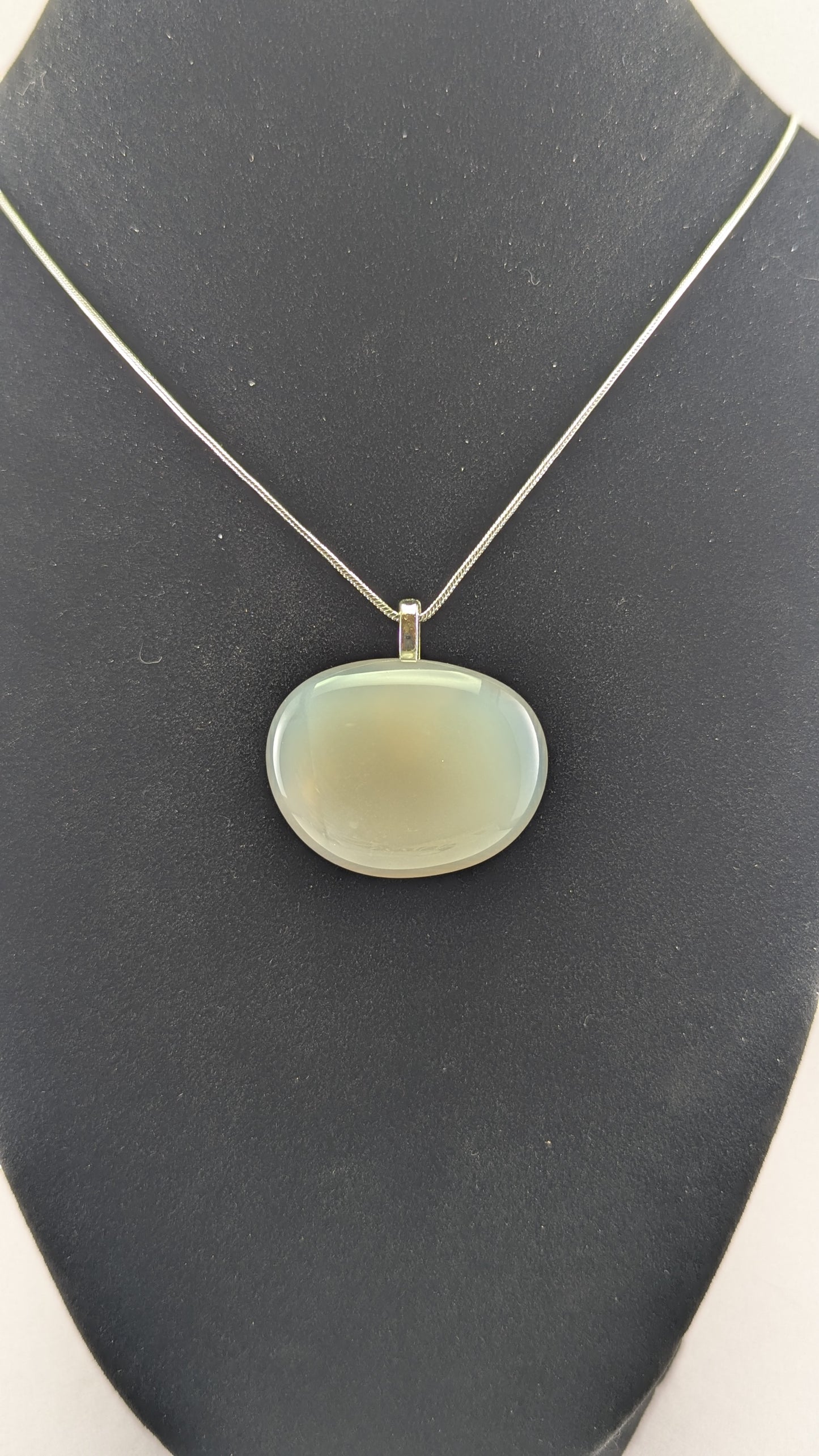 Luminous Oval Milky Quartz Pendant
