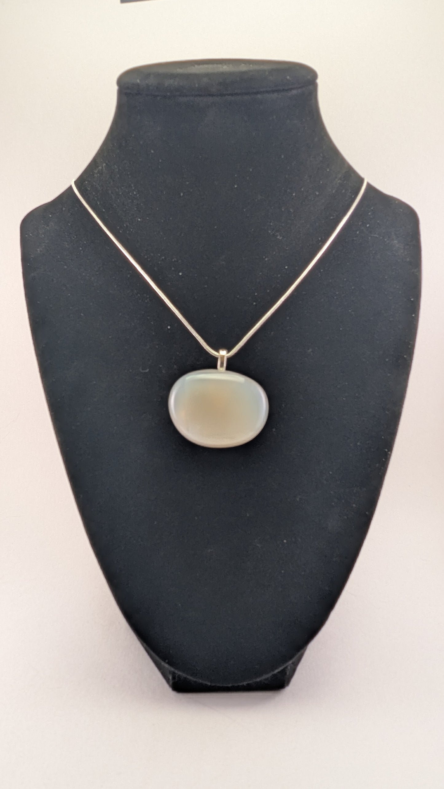 Luminous Oval Milky Quartz Pendant