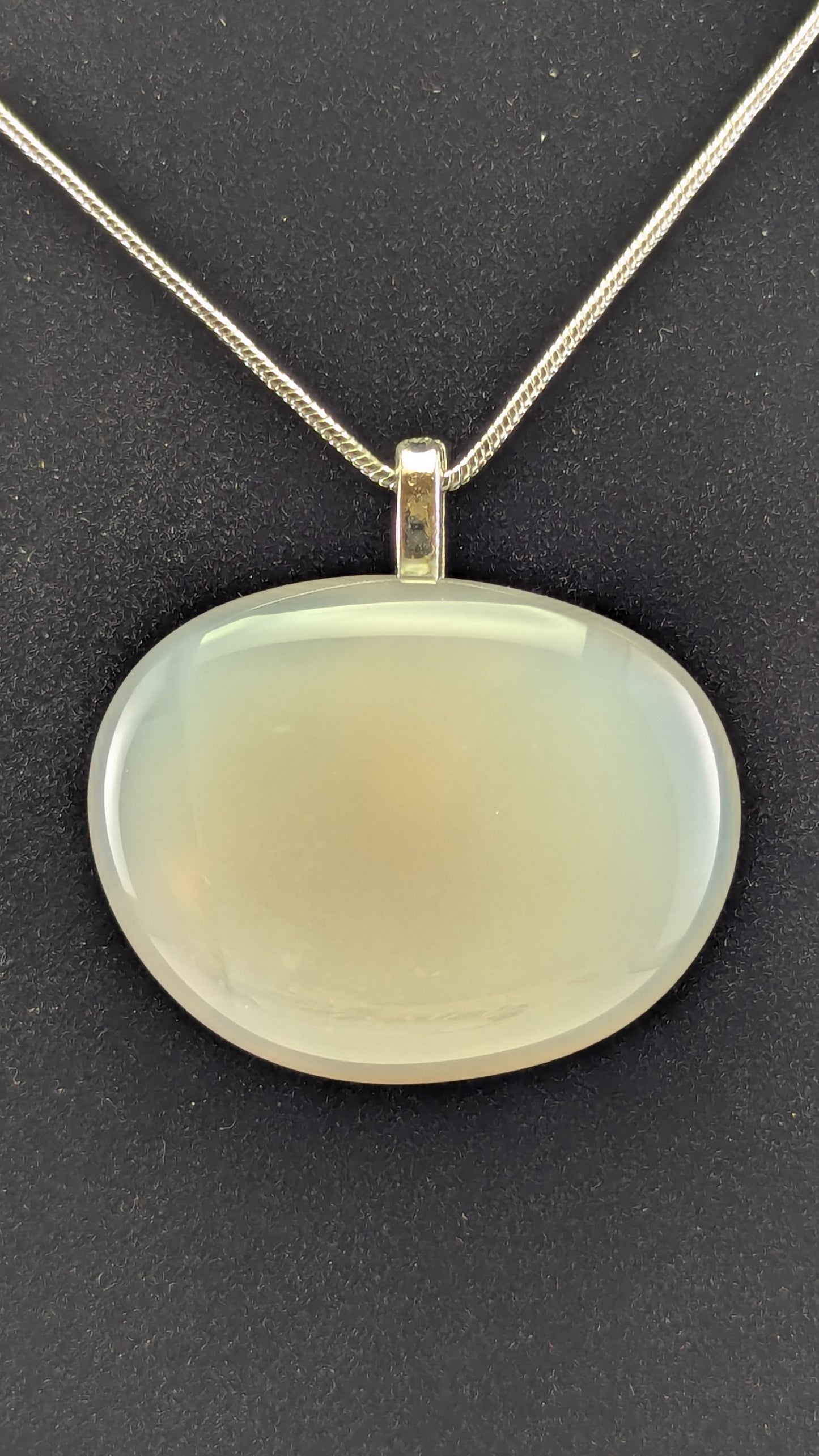 Luminous Oval Milky Quartz Pendant